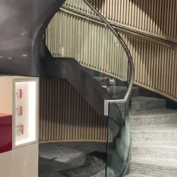 Victorinox Spiral UK Helical Staircase Bespoke Manufacturer cantilever floating stairs dog legged straight London Fit Out