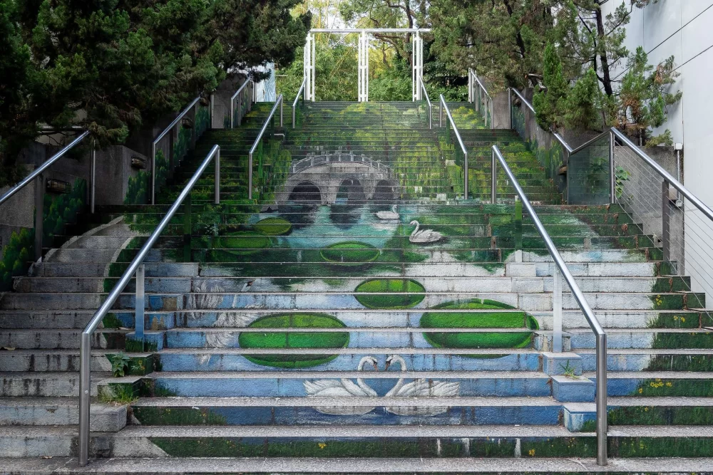 Outdoor stairs painted with an image of a lily pond