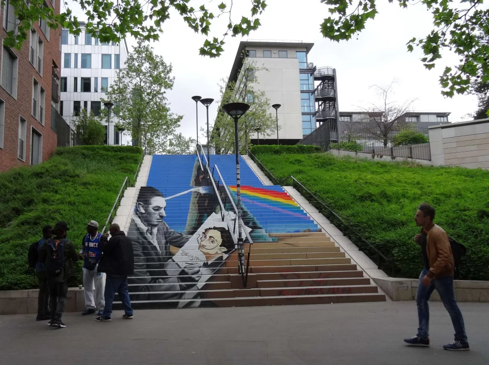 Painted staircase with a prism and image of Walt Disney and Salvador Dali