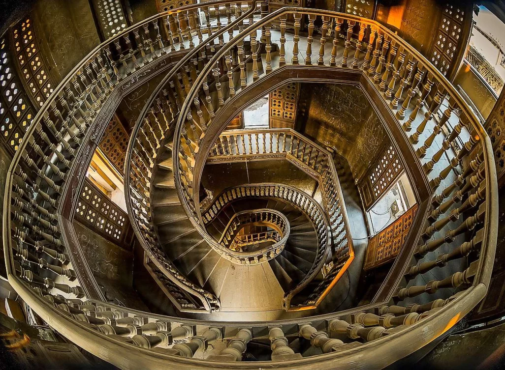 Looking down on the elaborate spiral staircase in The Baron's Palace